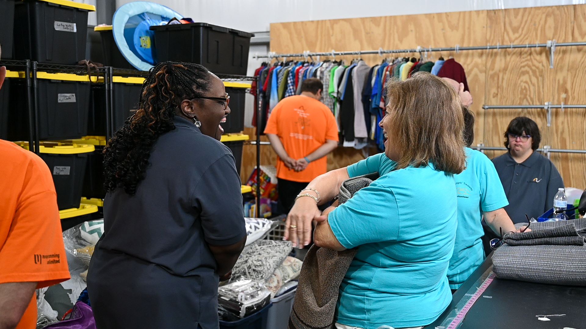 Volunteer and client serve at the ARC